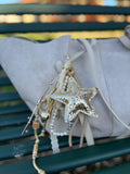 Grigri étoile dorée