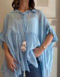 Blouse à volants bleue